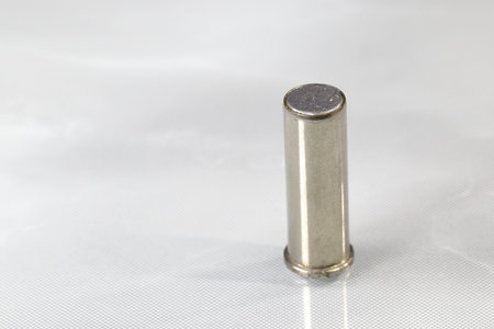 close up The .38 Special wadcutter bullet specifically designed for shooting paper targets isolated on reflection surface.の写真素材