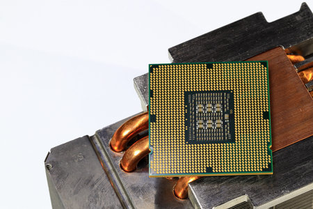 Close up Hight performance CPU with Aluminum and copper heat pipe heatsink isolated on white...