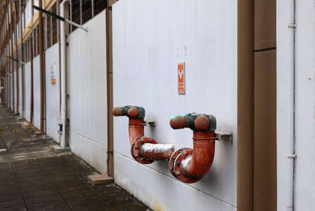 Fire hydrant standpipes  or fireplug connection at high rise building for  feed water into system when emergency occurred. Concept of fire equipment, safety,  fire prevention.の写真素材