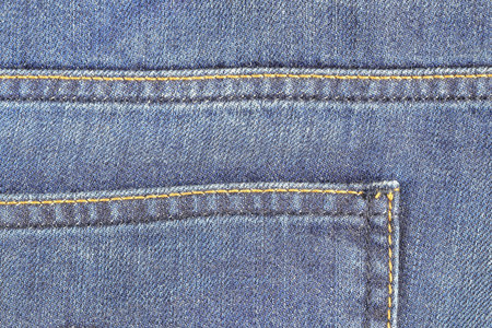 Detail of Back pocket of denim Jeans, Blue Jeans texture vintage background.
