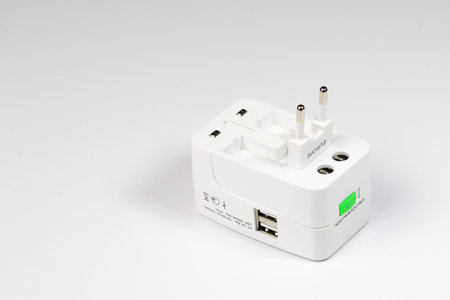 Universal plug adapter, travel plug adapter isolated on white background
