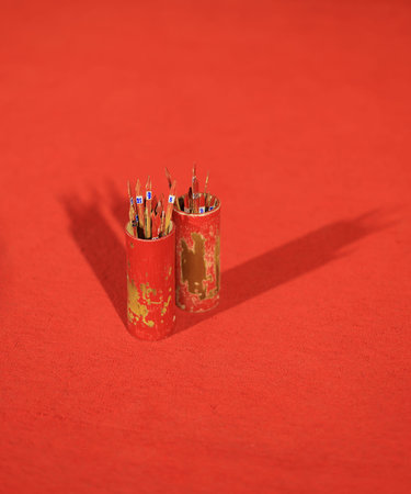 fortune stick for the advice from the God on red carpet. Fortune sticks ( Esiimsi ) in the temple...