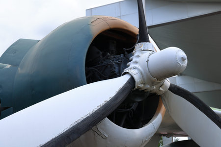 Close up engine and propeller of vintage plane.