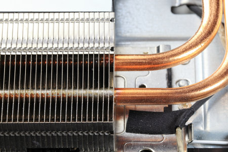 heat sink or heat pipe or computer processor cooler or radiator on notebook computer motherboard made from copper.の写真素材