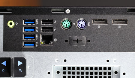 Close up ports on the back of the computer motherboard. The back of the motherboard with various...