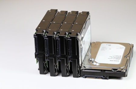 pile or stack of HDD, SSHD Hybrid hard disk drives 3.5 standard profile show on SATA interface,...