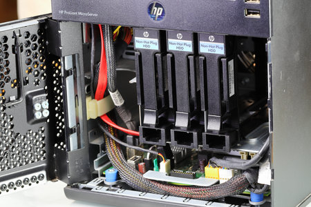 Inside of micro server computer. Computer circuit board and disk storage inside a small server class...