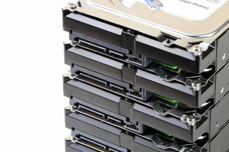 pile or stack of HDD, SSHD Hybrid hard disk drives 3.5 standard profile show on SATA interface,...
