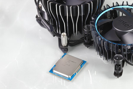 Close up Hight performance CPU with New active Aluminum and copper heatsink isolated on white...