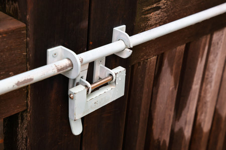 Old Japan style lock on the door. lock on the wooden door close-up. Traditional Japanese lock...