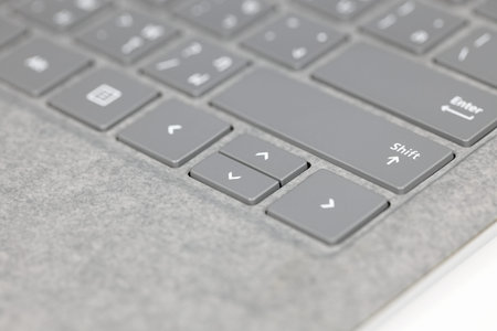 Modern computer notebook keyboard. some part of gray computer keyboard.