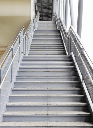 Long stair concrete in building, stairs in building corridor.