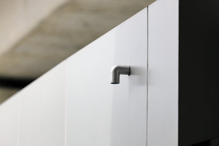 Roof PVC drain pipe or gutter, Rainwater downpipe. House drainage system on modern building.