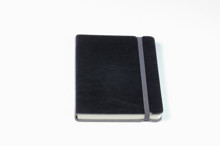 luxury Black Leather Agenda Diary Notebook, or appointment book with bookmark stripe isolated on white background.  Stationery item.の写真素材