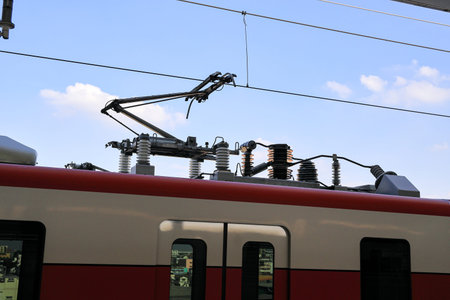 electric-rod pantograph of an electric train connecting the train to the overhead catenary wire.