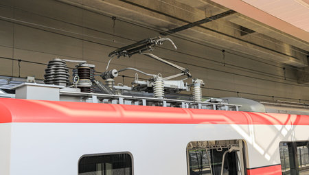electric-rod pantograph of an electric train connecting the train to the overhead catenary wire.