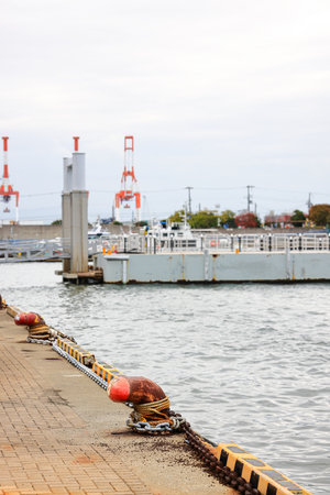 Mooring rusty bollard on pier referred to a post on a ship or quayの写真素材