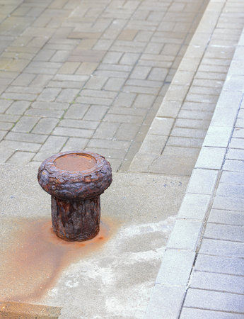 Rust of metals. Corrosion of metal. Rust and corrosion in the weld. Corrosive Rust on old iron, grunge rust texture, Rusty bollard on pier.の写真素材