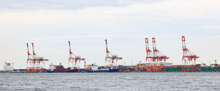 Container port at Osaka Japan, container crane at Industrial port for cargo container ship. Cargo...