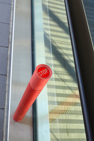 Emergency Stop button of escalator, red STOP button to turn off the movement of escalators.の写真素材