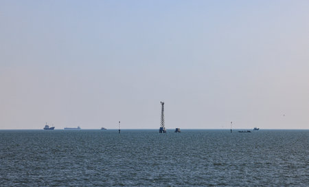 Panorama view of Light beacon, lighthouse, signal tower for water communication, a lighting lamp as...