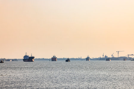Panorama view of ocean liner, Cargo Ship, going to port in Thai gulf zone near Samutprakarn province, Thailand.の写真素材