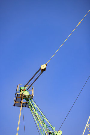 Structure part of the pulley attach to Big crane in an industrial port.