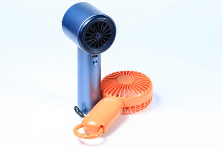 Portable fan side view, isolated on white background.の写真素材