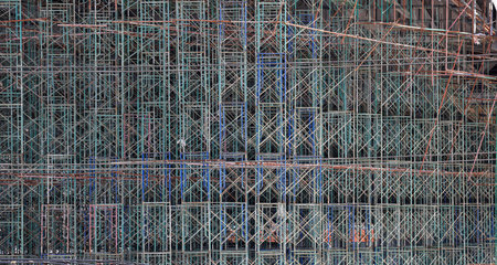 A large number of scaffoldings are used in large construction projects. Scaffolding for on...