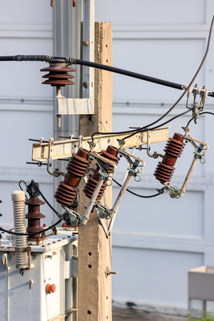 Old, abandoned electric pole, The electric post show with high voltage construction and power lines.