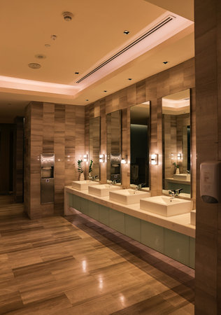 modern white ceramic wash basin in public toilet or restaurant or hotel or shopping mall or luxury...