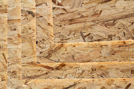 A stack of OSB sheets. Construction material. Top view. Copyspace.の写真素材
