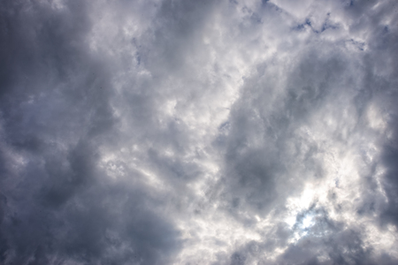 Thick and dangerous storm clouds in the skyの写真素材