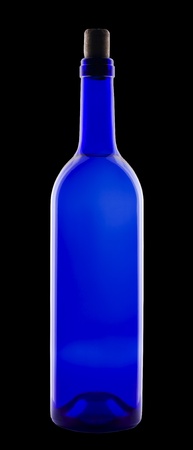 Wine in blue bottle  Isolated on black background の写真素材
