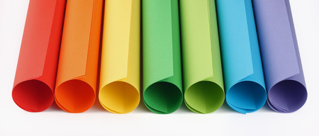 Rolls of colored construction paper on white backgroundの写真素材