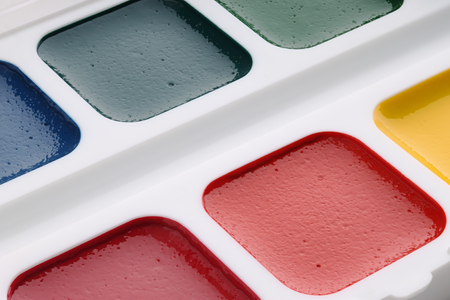 Watercolor paints close-upの写真素材