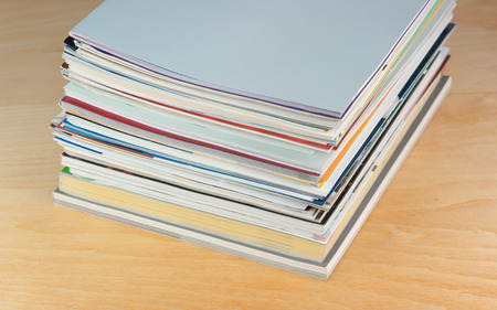 Brochures, and magazines on the tableの写真素材