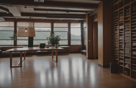 Interior of a modern office building with wooden furniture and bookcaseの素材
