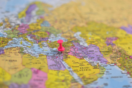 Red pushpin marks Egypt on political map of Europe, Middle East, and North Africa, indicating...