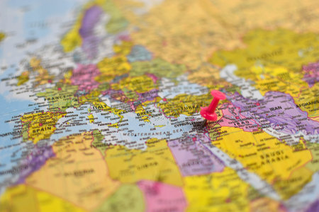 Red pushpin marks Egypt on political map of Europe, Middle East, and North Africa, indicating geographic focus or travel interest.の写真素材