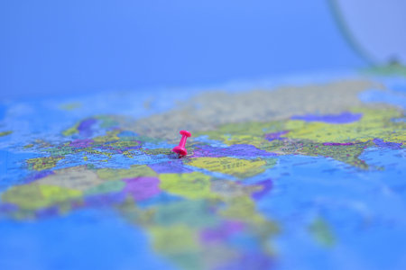 Red pushpin marks Egypt on political map of Europe, Middle East, and North Africa, indicating...