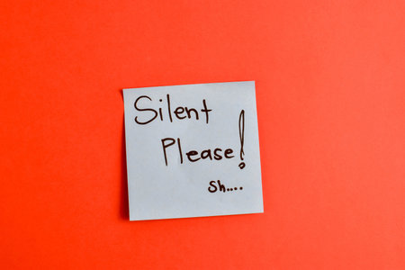 Handwritten note on red background reads with smiley face symbolic expression of affection and emotional warmth.の写真素材