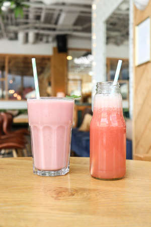 Pink milkshake drink in a cafeの写真素材