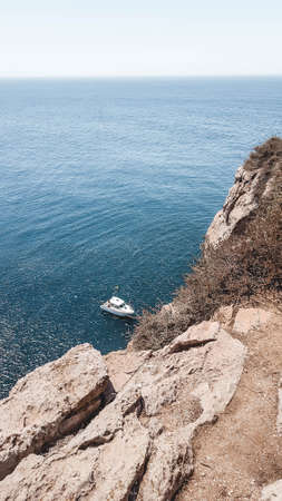 ocean view the cliffs in portugal algarve boatの写真素材