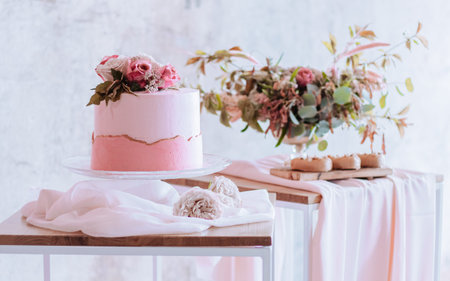 Wedding party sweet bar and cake in pink colorの写真素材
