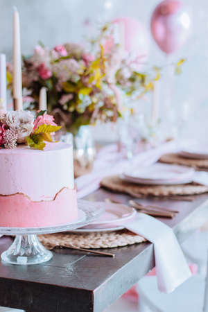 Wedding party sweet bar and cake in pink colorの写真素材