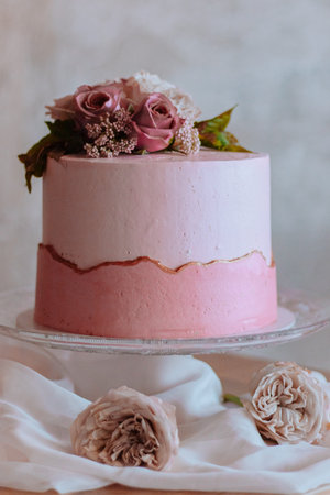 wedding cake and sweets in pink sweet bar