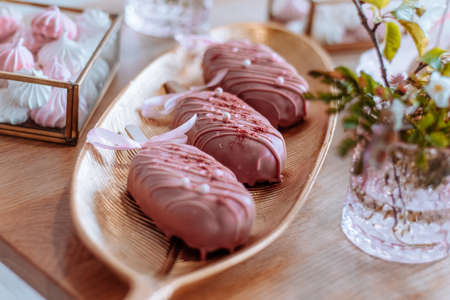Wedding party sweet bar and cake in pink colorの写真素材