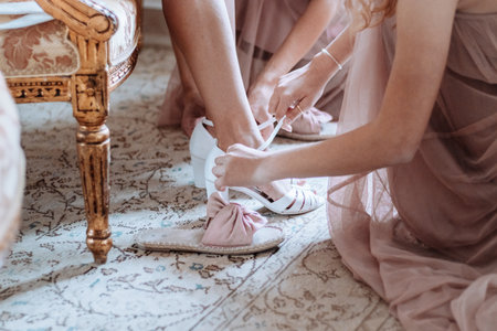 Bride is getting ready with her shoesの写真素材