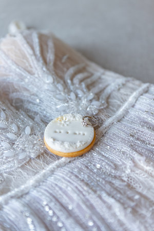 Cookies in the shape of a heart on a white lace backgroundの写真素材